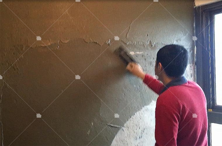 正在進行粉光工作的泥作師傅 正在進行粉光工作的泥作師傅